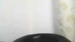 Glasses-wearing MILF reveals her huge breasts on webcam