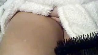 Spiky Hairy Brush Pleasures Pussy on Webcam