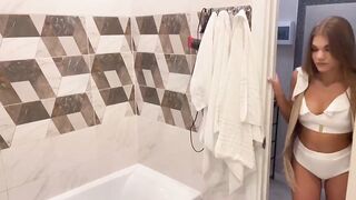 Blonde babe masturbates with a dildo after the beach.