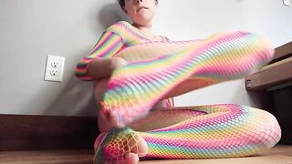 Teen in Rainbow Fishnets Fingers Herself