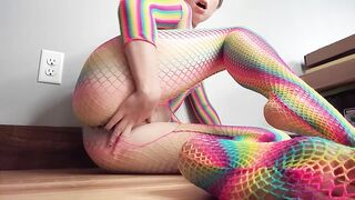 Teen in Rainbow Fishnets Fingers Herself