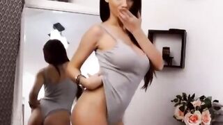 Brunette Teases Pussy with Dildo on Webcam