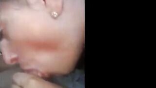 Pierced Brunette Blows in the Car