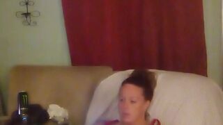 Step mom lifts up her dress and teases with her panties while she plays video games