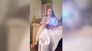 Mamacita horny and playing video games while getting her panties wet