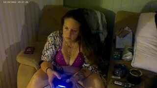 Hot Mom Smoking Cigarettes Playing video Games In Purple Bra and Panties