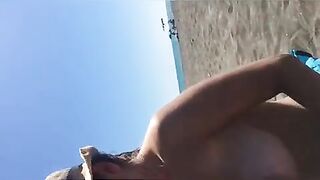 Smoking Latina with Big Tits at an Italian Beach