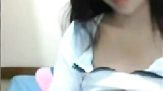 Skinny Indonesian Teen Shows Off Her Tits on Webcam